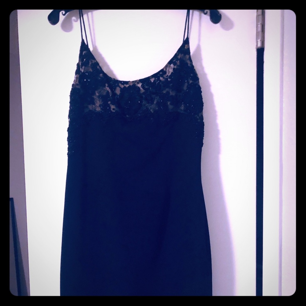 Carmen Marc Valvo black beaded cocktail dress.